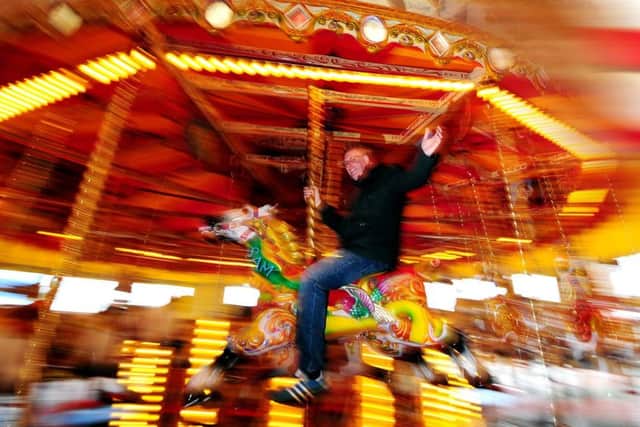 Carl Vince pictured on the 114 year old Carousel, one of many items up for auction at Pleasure Island, Cleethorpes.
Picture by Simon Hulme