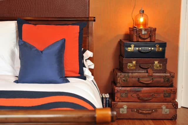 The bedroom was inspired by Ralph Lauren's signature style and the trunks are from an attic sale at Chatsworth House
