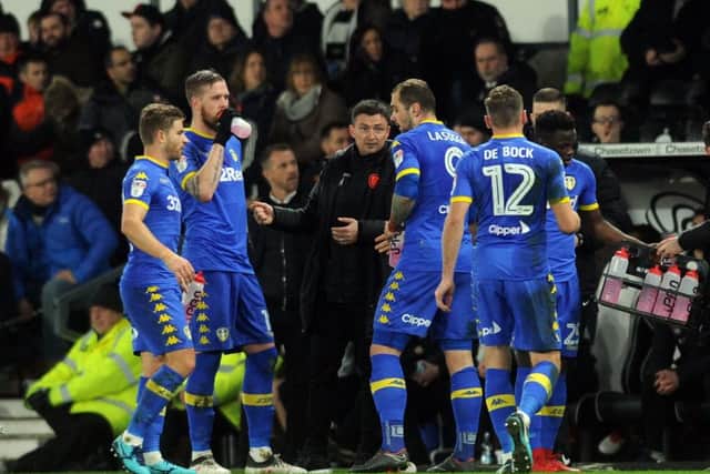 Leeds United's manager Paul Heckingbottom speaks to his team after Pierre-Michel Lasogga's goal had put them ahead at Pride Park.  Picture: Tony Johnson.