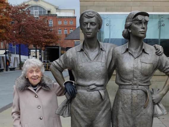 Audrey Walton with the Women of Steel statue