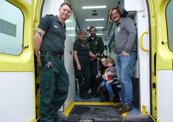 Ambulance crew Andy Towers, Wendy Durkin and Andrew Hughes with Leeds couple Katy and Ian Bavill and their son Ralph.