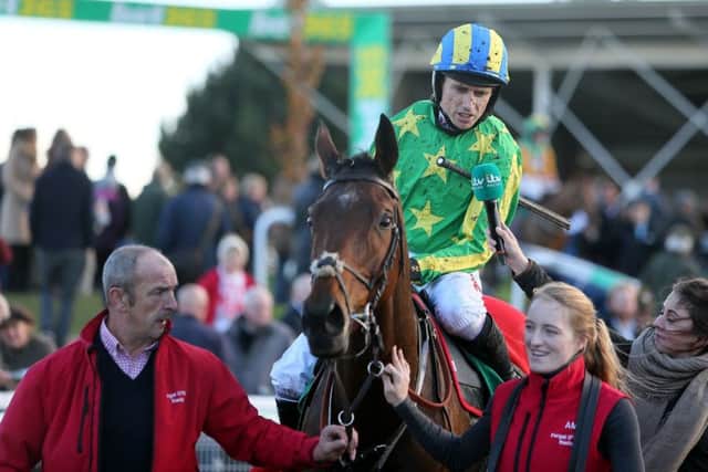 Colin's Sister with Paddy Brennan after winning the bet365 Hurdle at Wetherby.
