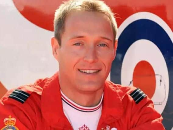 Photo issued by the Ministry of Defence of Flight Lieutenant Sean Cunningham, a Red Arrows pilot who died at RAF Scampton, Lincolnshire, in 2011.