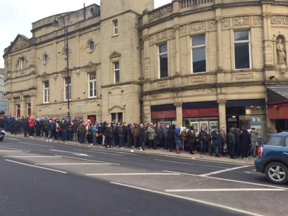 Kasabian fans queuing for tickets outside the Victoria Theatre in Halifax.