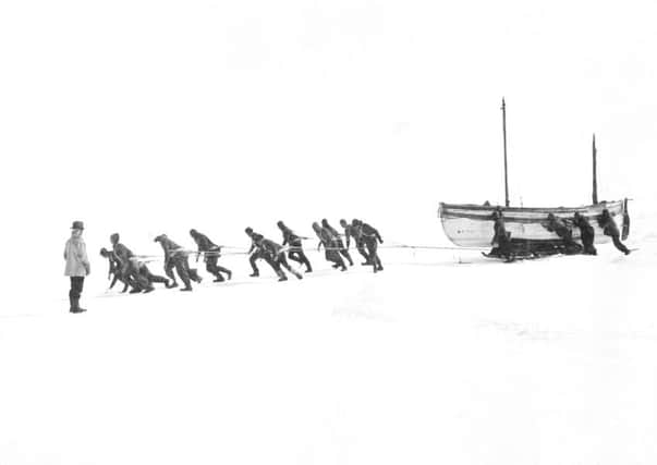 Relaying the James Caird across the ice. Photograph by Frank Hurley. Â© Royal Geographical Society (with IBG) S0000837