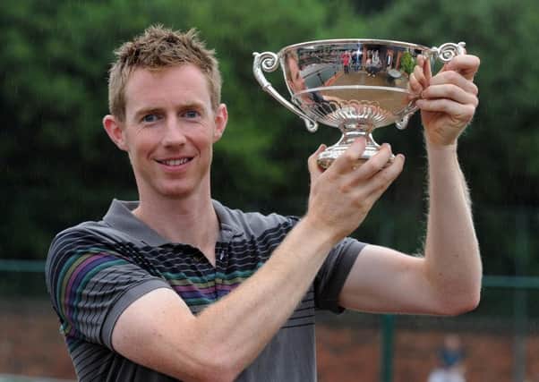 Jonny Marray, Wimbledon Men's Double Champion of 2012, celebrating his success at Hallamshire Tennis Club, Sheffield, where he is now back coaching.