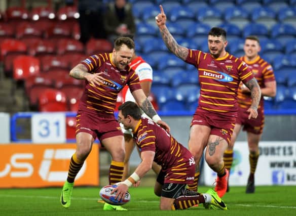 Danny Brough celebrates his equalising try against St Helens.