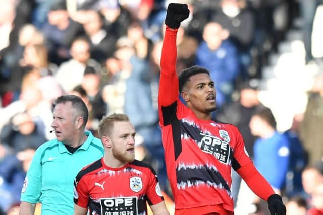 Goal joy: Huddersfield Town's Steve Mounie celebrates scoring his side's second goal of the game.