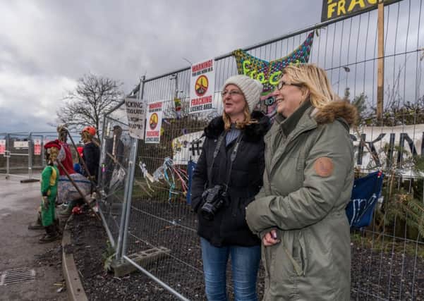 Anti-fracking protesters Julie Winship, and Suzanne Rayment,  near the entrance of the of Kirby Misperton fracking site on the edge of the village. 
Picture James Hardisty.