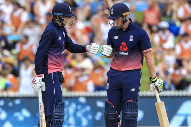 England's Ben Stokes receives a fist bump from Yorkshires Joe Root after a boundary (Picture: John Cowpland/AP).