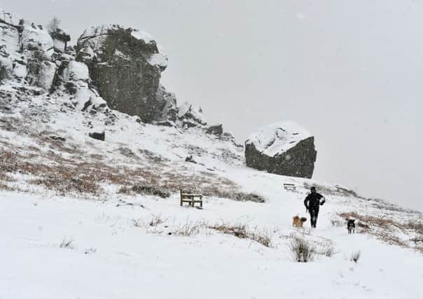 A wintry scene on the Cow and Calf rocks near Ilkley.