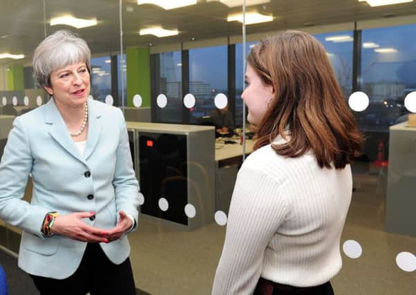 Apprentice journalist Natasha Meek speaking to Theresa May at The Yorkshire Post offices last week.