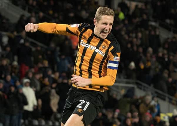 Michael Dawson celebrates his equaliser for 
Hull City against Barnsley (Picture: Bruce Rollinson).