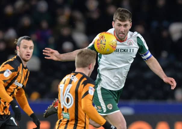 Gary Gardner heads clear of Seb Larsson during the 1-1 draw between Hull City and Barnsley FC (Picture: Bruce Rollinson)