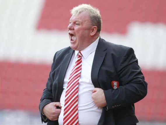 Steve Evans has been unveiled as the new Peterborough manager.