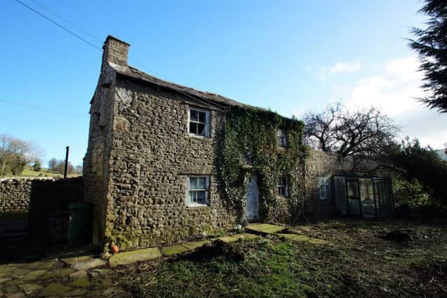 Grafton and Gooselane cottages, Thoralby, near Leyburn. A semi-detached cottage with a detached cottage in the grounds, both in need of renovation. Guide price Â£200,000 to Â£250,000, www.robinjessop.co.uk