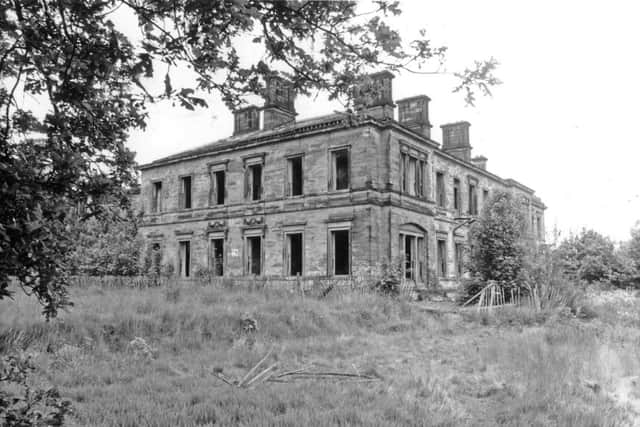 The exterior of Oulton Hall in 1989 in a state of disrepair.