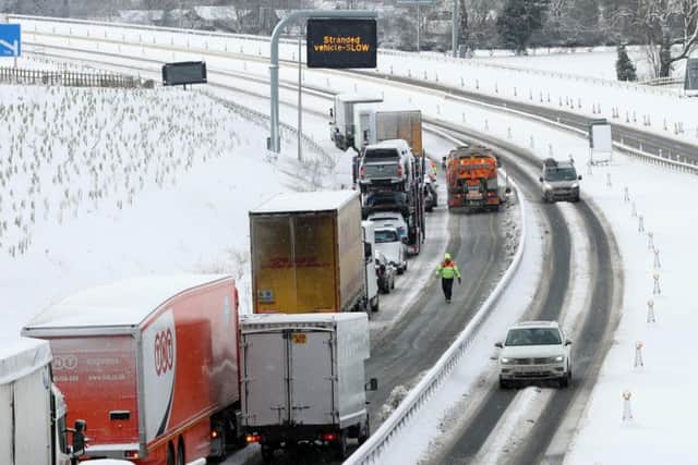A gritter tries to clear the A1 motorway near to Catterick, North Yorkshire, where a jack-knifed lorry closed the motorway after the beast from the east dumped snow on the UK. Picture Glen Minikin.