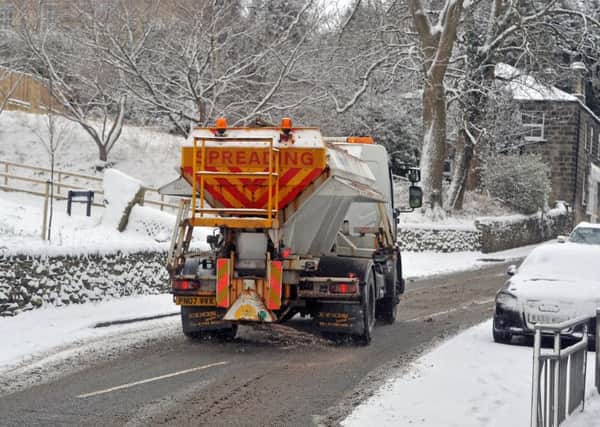 28 February 2018......   A council gritter in the snow on Farsley Town Street.  Picture Tony Johnson.