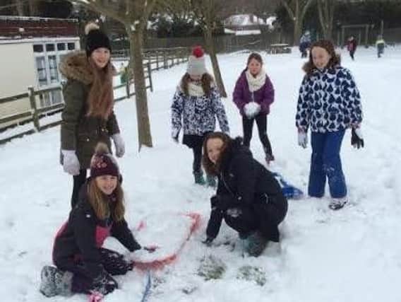 Pupils at Dobcroft Infant and Junior Schools enjoy the snow