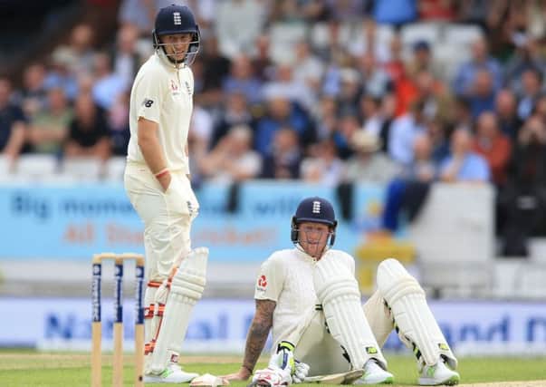 England's Joe Root (left) and Ben Stokes in Test match action (Picture: PA)