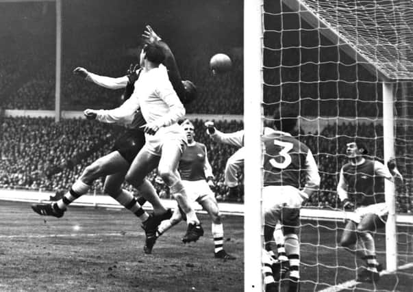Terry Cooper netted the only goal of the game after George Graham cleared from under Arsenal's crossbar as Leeds United beat the Gunners 1-0 in the 1968 League Cup final at Wembley (Picture: Sport & General Press Agency).
