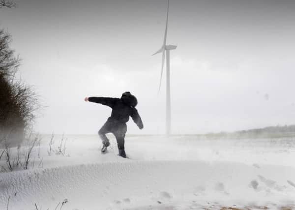 A Man walks through snow drifts and blizzard conditions at Hook Moor Wind Farm, near Garforth, Leeds... 1st March 2018 ..Picture by Simon Hulme