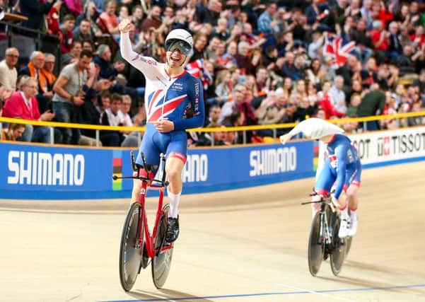 Charlie Tanfield, left, and Ed Clancy celebrate Great Britains gold in the Mens Team Pursuit final (Picture: Alex Whitehead/SWpix.com).