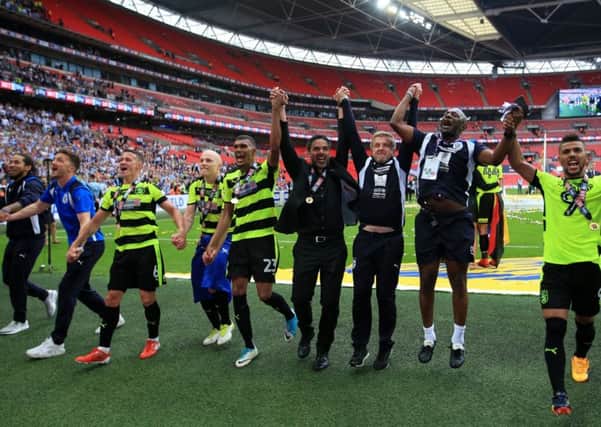 Wembley winners: Huddersfield Town coach David Wagner leads the celebrations.