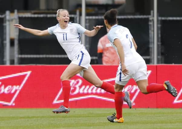 Goal: England's Toni Duggan, left, celebrates scoring against France.