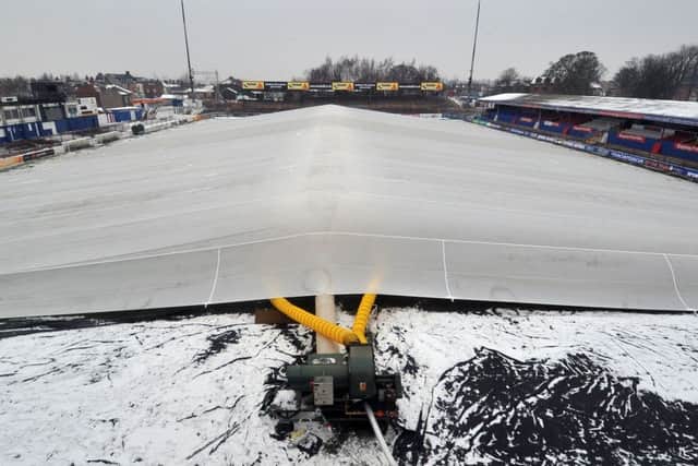 A huge fan heater used to keep the pitch playable at  Wakefield Trinity.