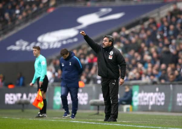 Huddersfield Town manager David Wagner gestures on the touchline.