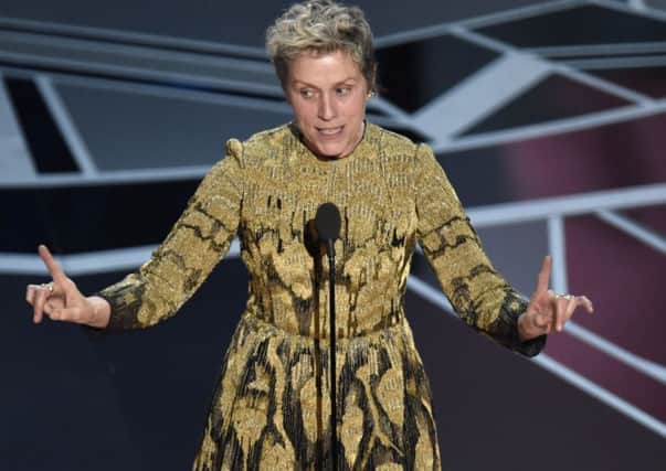 Frances McDormand accepts the award for best performance by an actress in a leading role for "Three Billboards Outside Ebbing, Missouri" at the Oscars.