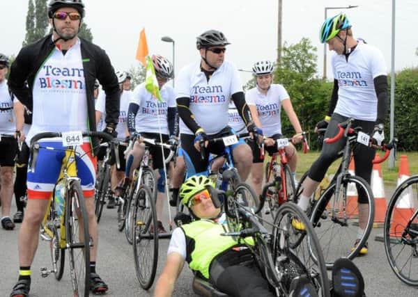 A group of veterans  including some severely disabled  are preparing to take on a 100-mile bike ride through the Vale of York on Saturday 26th May, to raise money for Military Charity Blesma, the Limbless Veterans and Cancer Research UK. Pictured centre, in the yellow shirt, is organiser Jonathan Bell