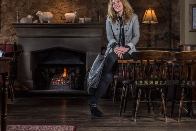 At the Shoulder of Mutton, Kirkby Overblow, Fiona Martin wears longline military jacket, Â£49; lace top, Â£32; chain detail foldover bag, Â£26; boots, from a selection. All at at Best Kept Secret Clothing.