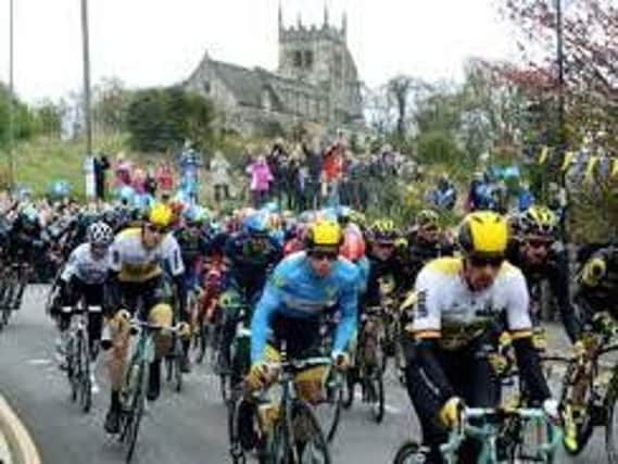 Tour de Yorkshire. The men's race passes All Saints Church in Sherburn-in-Elmet. Picture : Jonathan Gawthorpe