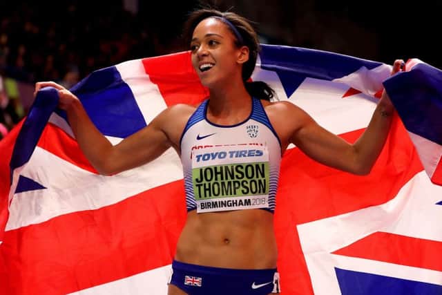 TOP GIRL: Katarina Johnson-Thompson celebrates after winning gold in the women's Pentathlon at the 2018 IAAF Indoor World Championships. Picture: Martin Rickett/PA