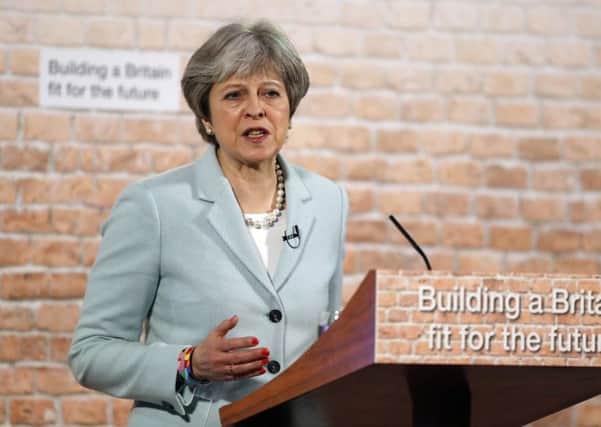 Prime Minister Theresa May during a speech in central London where she announced plans to make it harder for developers who "sit on land and watch its value rise" to get planning permission from councils as part of proposals to tackle the "national housing crisis".