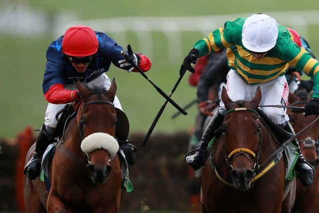 Old Guard and Harry Cobden, left, win the 2015 Greatwood Hurdle.