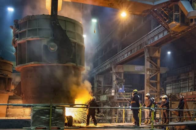 Here, a steelworker burns through a sand plug in a nozzle under the ladle and molten steel at over 1500 degrees celcius flows out into the precision made mould. Up to 105 tonnes of steel can pour from a single ladle.