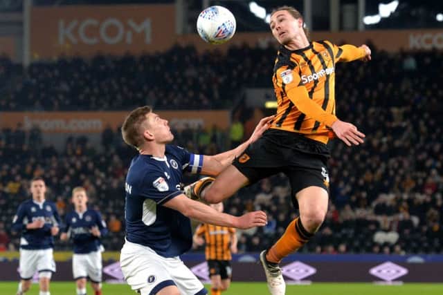 Jackson Irvine beats Shaun Hutchinson to a high ball.
 (Picture: Bruce Rollinson)