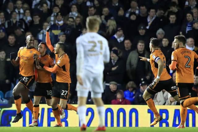 Wolverhampton Wanderers' Willy Boly (left) celebrates scoring his side's second goal.