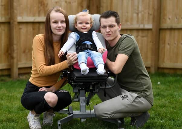 The mother of a 20-month-old toddler from Fitzwilliam, who has limited use of her arms and legs  has launched a Â£20,000 fundraising drive to take her for specialist treatment in Panama. Imogen Holmes was diagnosed with spastic quadriplegic cerebral palsy at Pinderfields Hospital in June 2017. Imogens mother Briony Winstanley has started a Â£20,000 fundraising drive to to pay for stem cell treatment for Imogen in Panama in central America. Imogen pictured with her parents Briony Winstanley and Stephen Holmes. 9th March 2018. Picture Jonathan Gawthorpe