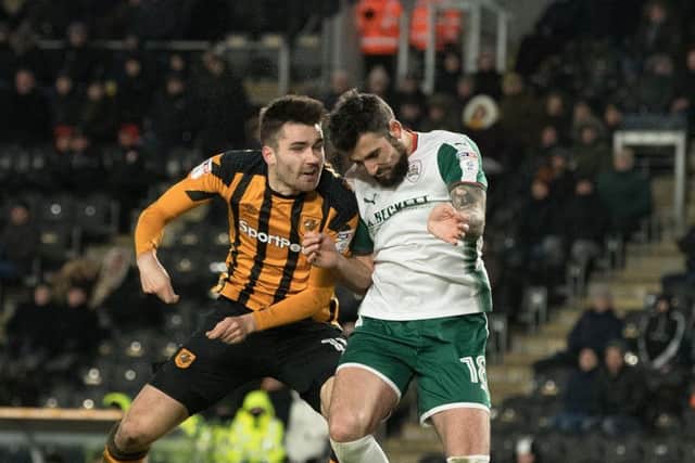 IN CONTENTION: Barnsley's  Adam Jackson, in action against Hull City last month.  Picture: Bruce Rollinson