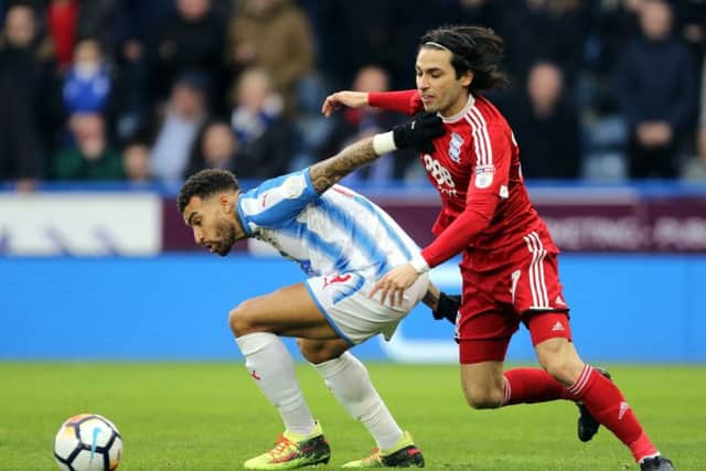 Huddersfield Town's Danny Williams, left, duels with Birmingham City's Jota in the FA Cup in January (Picture: Richard Sellers/PA Wire).