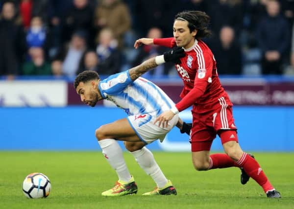Huddersfield Town's Danny Williams, left, duels with Birmingham City's Jota in the FA Cup in January (Picture: Richard Sellers/PA Wire).