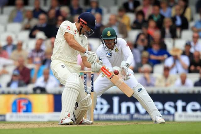 England's Alastair Cook (left) and South Africa's Quinton de Kock.