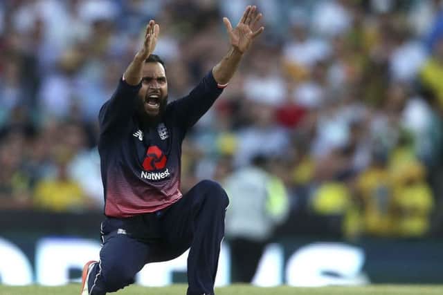 England's Adil Rashid took three wickets. Picture: AP/Rick Rycroft)