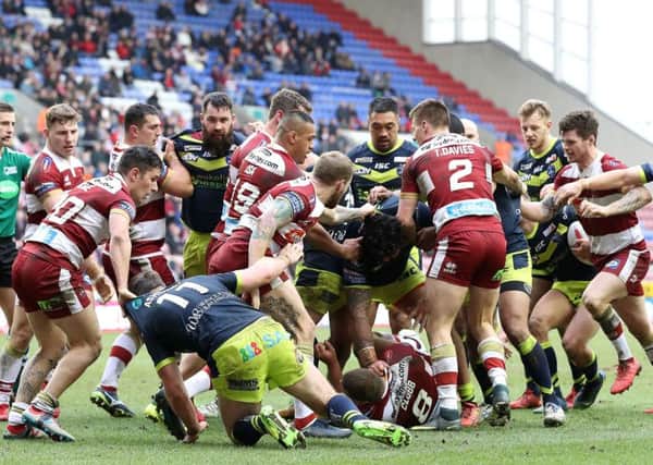 Tempers flare during the game between Wigan Warriors and Wakefield Trinity