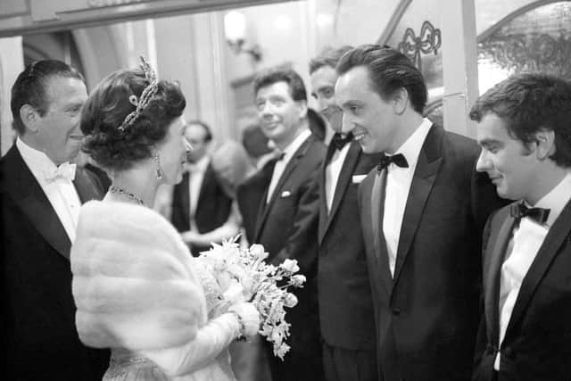 Queen Elizabeth II talks with Liverpool comedian Ken Dodd when the stars were presented at the Royal Variety Performance at the London Palladium in 1965. Also pictured are Max Bygraves, Spike Milligan and Dudley Moore. Picture: PA Archive/PA Wire
